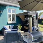 Det Blagronne Hus * Hals