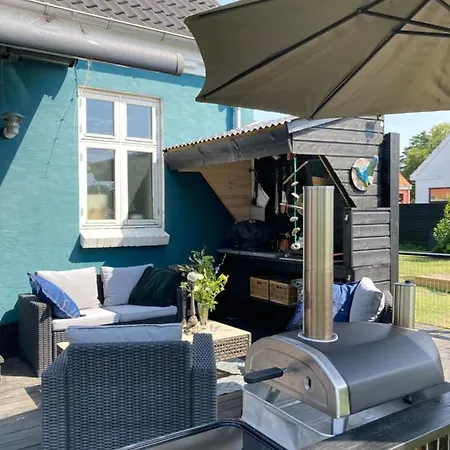 Det Blagronne Hus * Hals